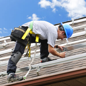 Contractor on roof with business insurance in Defiance, OH
