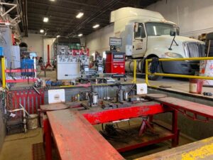 Truck in shop with auto repair shop insurance in Otsego, OH